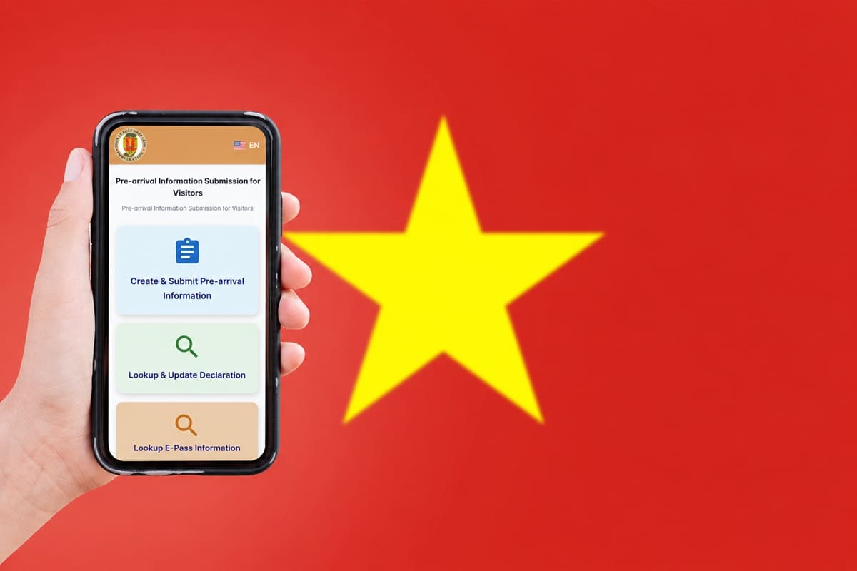 Hand holding a smartphone showing an app screen for pre-arrival information, with options to Create & Submit, Lookup, and E-Pass information, against a red background with a yellow star (Vietnam flag).